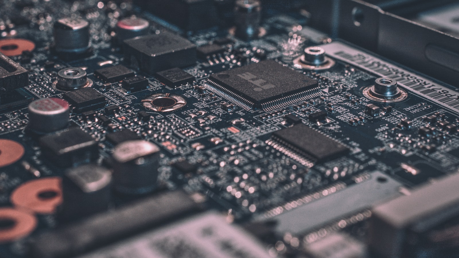 Macro photograph of a circuit board representing AI infrastructure and compute